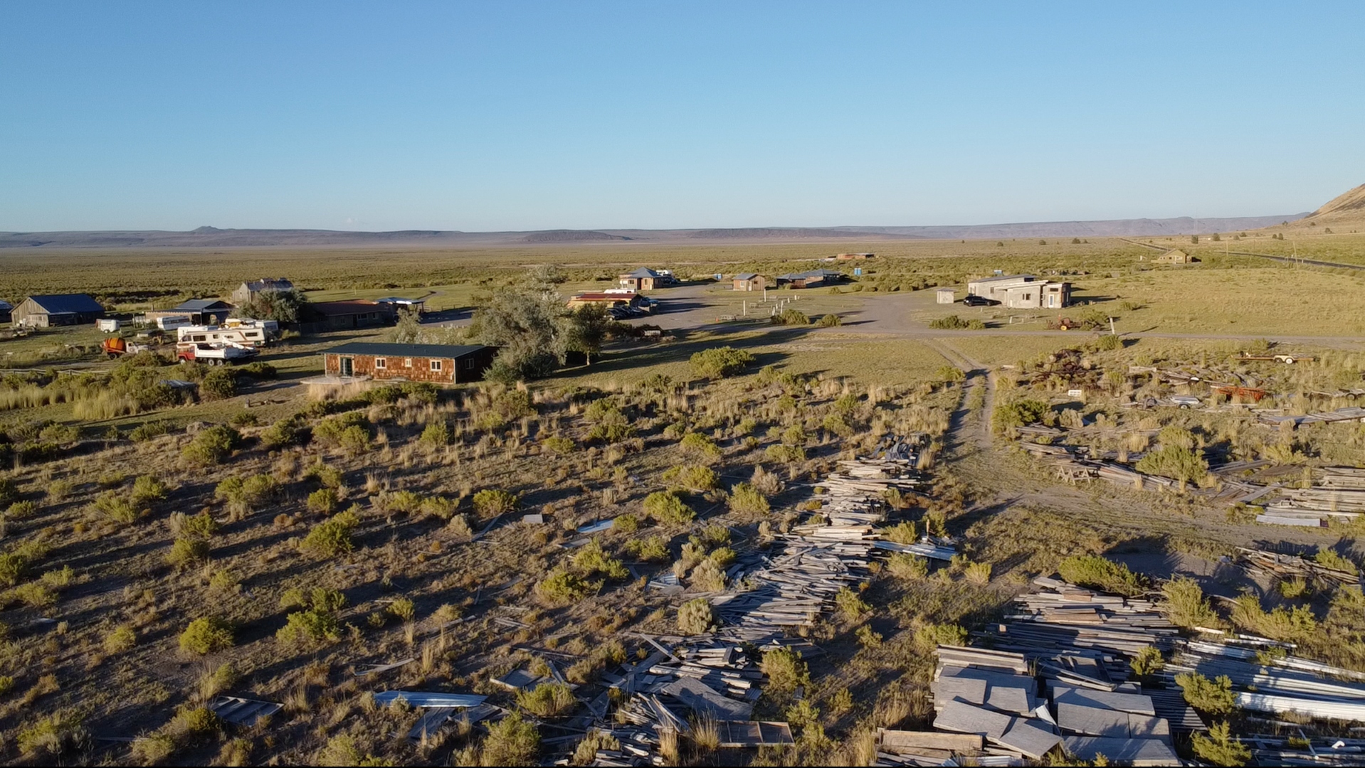Aerial drone view of Summer Lake Hot Springs with sagebrush desert